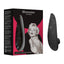 Womanizer x Marilyn Monroe Special Edition Clitoral Stimulator has 10 contactless Pleasure Air Technology modes for multiple clitoral orgasms that won't numb you. Black marble-package.