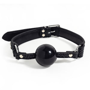  Zorba Patent Leather Snakeskin & Diamante Solid Ball Gag combines patent & soft leathers in a snakeskin pattern w/ 2 rows of rhinestones for a glamorous look.